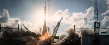 Movie still from “Batman v Superman: Dawn of Justice” (2016), directed by Zack Snyder – A rocket is being launched into the sky; Extreme Wide shot, Low angle