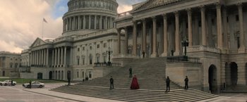 Movie still from “Batman v Superman: Dawn of Justice” (2016), directed by Zack Snyder – A group of people standing on the steps of the capitol building; Extreme Wide shot, High angle