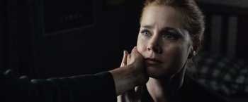 Movie still from “Batman v Superman: Dawn of Justice” (2016), directed by Zack Snyder – A person touching the face of another person; Close Up shot, Over the shoulder angle