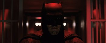 Movie still from “Batman v Superman: Dawn of Justice” (2016), directed by Zack Snyder – A person wearing a batman mask; Close Up shot, Low angle