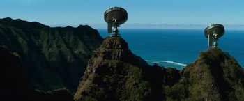 Movie still from “Battleship” (2012), directed by Peter Berg – A satellite dish on top of a mountain near the ocean; Extreme Wide shot, High angle