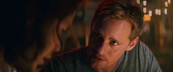 Movie still from “Battleship” (2012), directed by Peter Berg – A man's face as a woman looks at him; Close Up shot, Over the shoulder angle