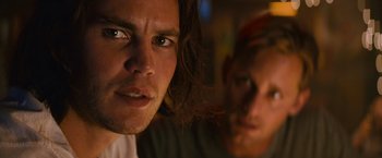 Movie still from “Battleship” (2012), directed by Peter Berg – A person with long brown hair; Close Up shot, Low angle