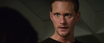 Movie still from “Battleship” (2012), directed by Peter Berg – A man's face in a black shirt; Close Up shot, Over the shoulder angle