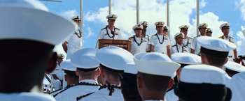 Movie still from “Battleship” (2012), directed by Peter Berg – A group of men standing next to each other in uniform; Wide shot, Over the shoulder angle