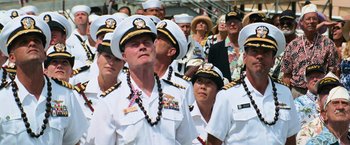 A group of people in uniform are gathered together