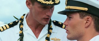 Movie still from “Battleship” (2012), directed by Peter Berg – Two men in military uniforms talking to each other; Close Up shot, Over the shoulder angle