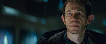 Movie still from “Battleship” (2012), directed by Peter Berg – A person wearing a jacket; Close Up shot, Over the shoulder angle