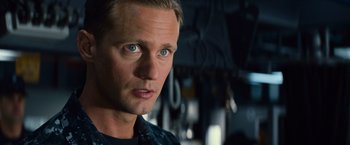 Movie still from “Battleship” (2012), directed by Peter Berg – A person wearing a black shirt; Close Up shot, Over the shoulder angle