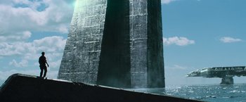 Movie still from “Battleship” (2012), directed by Peter Berg – A tall building in the middle of the ocean; Extreme Wide shot, Low angle