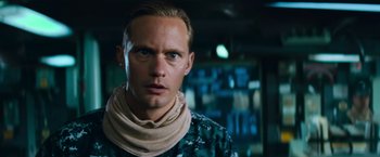 Movie still from “Battleship” (2012), directed by Peter Berg – A person wearing a neck scarf; Close Up shot, Low angle