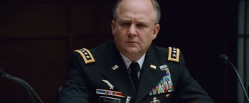 Movie still from “Battleship” (2012), directed by Peter Berg – A person wearing a military uniform; Close Up shot, Low angle