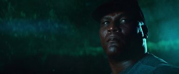 Movie still from “Battleship” (2012), directed by Peter Berg – A person wearing a hat; Close Up shot, Low angle