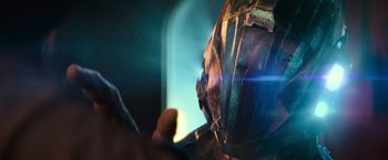 Movie still from “Battleship” (2012), directed by Peter Berg – A person is holding a cell phone in front of a mirror; Extreme Close Up shot, Over the shoulder angle