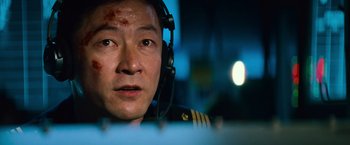 Movie still from “Battleship” (2012), directed by Peter Berg – A person wearing a headset; Close Up shot, Low angle