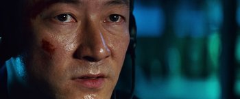 Movie still from “Battleship” (2012), directed by Peter Berg – A person wearing a headset; Extreme Close Up shot, Low angle