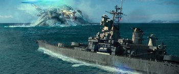 Movie still from “Battleship” (2012), directed by Peter Berg – A large military ship in the middle of the ocean; Extreme Wide shot, Low angle