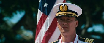 Movie still from “Battleship” (2012), directed by Peter Berg – A person wearing a hat; Close Up shot, Low angle