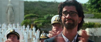 Movie still from “Battleship” (2012), directed by Peter Berg – A group of men in suits and hats standing next to each other; Close Up shot, Over the shoulder angle