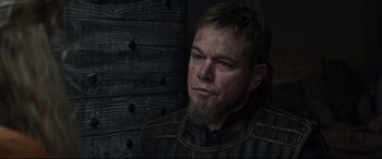 Movie still from “The Last Duel” (2021), directed by Ridley Scott – A person with a beard; Close Up shot, Over the shoulder angle