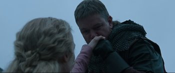 Movie still from “The Last Duel” (2021), directed by Ridley Scott – A man and a woman in chains are kissing; Close Up shot, Over the shoulder angle