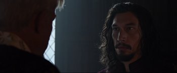 Movie still from “The Last Duel” (2021), directed by Ridley Scott – A person with long hair; Close Up shot, Over the shoulder angle