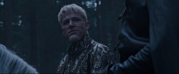 Movie still from “The Last Duel” (2021), directed by Ridley Scott – A person wearing a shirt; Close Up shot, Over the shoulder angle