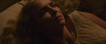 Movie still from “The Last Duel” (2021), directed by Ridley Scott – A person laying on the ground; Close Up shot, Overhead angle