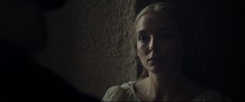 Movie still from “The Last Duel” (2021), directed by Ridley Scott – A beautiful young lady looking into a mirror; Close Up shot, Over the shoulder angle