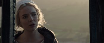 Movie still from “The Last Duel” (2021), directed by Ridley Scott – A person wearing a jacket; Close Up shot, Over the shoulder angle