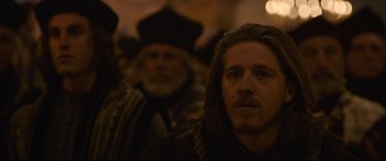 Movie still from “The Last Duel” (2021), directed by Ridley Scott – A person with a beard; Close Up shot, Over the shoulder angle