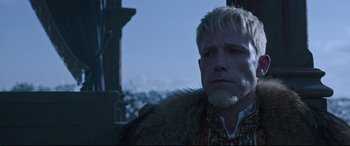 Movie still from “The Last Duel” (2021), directed by Ridley Scott – A person wearing a fur coat; Close Up shot, Low angle