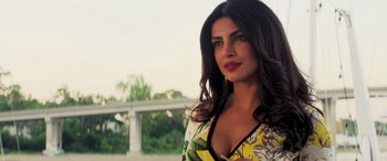 Movie still from “Baywatch” (2017), directed by Seth Gordon – A person with long hair; Close Up shot, Over the shoulder angle