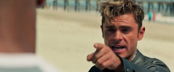 Movie still from “Baywatch” (2017), directed by Seth Gordon – A person pointing at the camera; Close Up shot, Over the shoulder angle