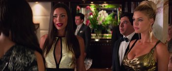 Movie still from “Baywatch” (2017), directed by Seth Gordon – A woman standing next to a man in front of a mirror; Close Up shot, Over the shoulder angle