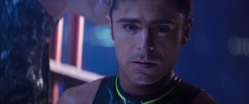 Movie still from “Baywatch” (2017), directed by Seth Gordon – A man's face in a dark room; Close Up shot, Over the shoulder angle
