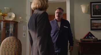 Movie still from “Beau Is Afraid” (2023), directed by Ari Aster – A man and a woman standing in front of a mirror; Medium shot, Over the shoulder angle