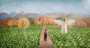 Movie still from “Beau Is Afraid” (2023), directed by Ari Aster – A painting of a boy standing on a brick path in the middle of a field with an angel; Extreme Wide shot, High angle