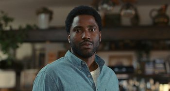 A person wearing a blue shirt