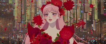 Movie still from “Belle” (2021), directed by Mamoru Hosoda – A woman with pink hair is surrounded by red flowers; Close Up shot, Low angle