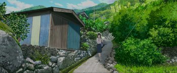 Movie still from “Belle” (2021), directed by Mamoru Hosoda – A woman walking down a road in a wooded area; Extreme Wide shot, High angle