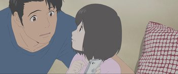 Movie still from “Belle” (2021), directed by Mamoru Hosoda – A woman holding a cell phone in front of a man; Close Up shot, Over the shoulder angle