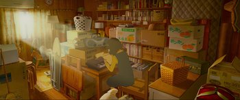 Movie still from “Belle” (2021), directed by Mamoru Hosoda – A woman sitting at a table in front of a book case; Wide shot, High angle
