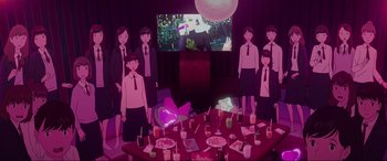 Movie still from “Belle” (2021), directed by Mamoru Hosoda – A group of people standing in front of a table with food; Extreme Wide shot, High angle