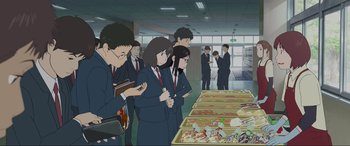 Movie still from “Belle” (2021), directed by Mamoru Hosoda – A group of people standing in front of trays of food; Wide shot, Low angle