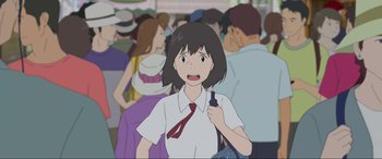 Movie still from “Belle” (2021), directed by Mamoru Hosoda – An animated woman with a red tie holding a cell phone; Close Up shot, Over the shoulder angle