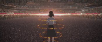 Movie still from “Belle” (2021), directed by Mamoru Hosoda – A woman standing in front of a crowd of people; Extreme Wide shot, High angle