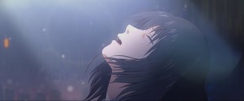 Movie still from “Belle” (2021), directed by Mamoru Hosoda – A woman with long black hair is looking up at the sky; Extreme Close Up shot, Overhead angle