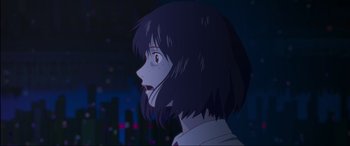 Movie still from “Belle” (2021), directed by Mamoru Hosoda – A person with short black hair; Close Up shot, Over the shoulder angle