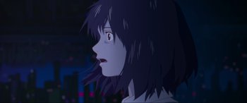 Movie still from “Belle” (2021), directed by Mamoru Hosoda – A person's face in the dark; Close Up shot, Low angle